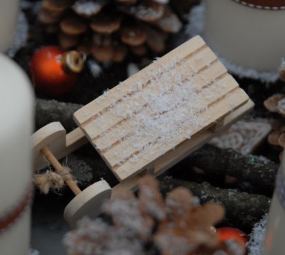 Adventní věnec se sáňkami